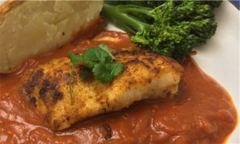 Spiced Pan-Fried Tusk on a Lightly Spiced Tomato Sauce